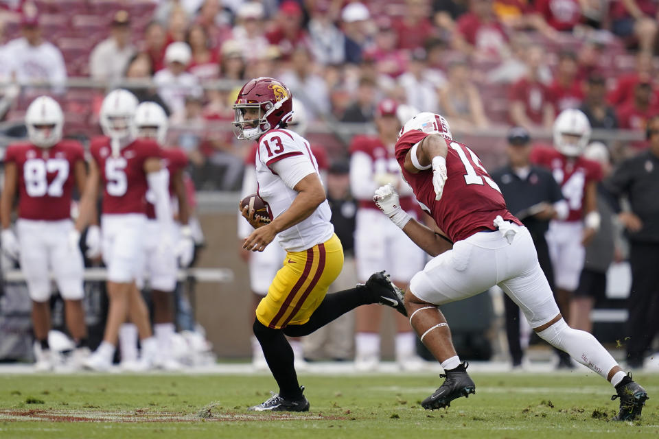 Southern California quarterback Caleb Williams (13) runs the ball against Stanford during the first half of an NCAA college football game in Stanford, Calif., Saturday, Sept. 10, 2022. (AP Photo/Godofredo A. Vásquez)