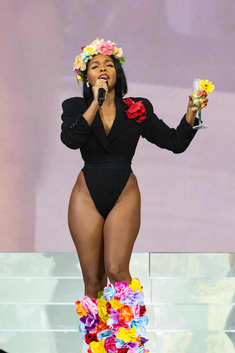 Janelle Monáe performs in floral boots at Glastonbury Festival 2024, 3D style, flowers, festival boots, festival style 