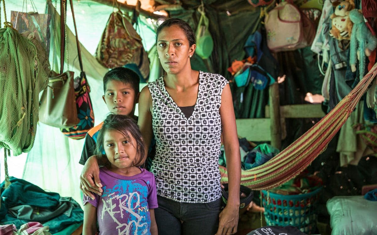 Maria's two children, Jorge and Evalene, have hepatitis A but the family are unable to pay for medical treatment.  - Glenna Gordon/Save the Children