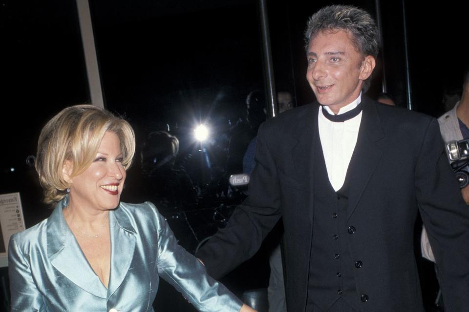 <p>Ron Galella, Ltd./Ron Galella Collection via Getty</p> Bette Midler and Barry Manilow in 1998