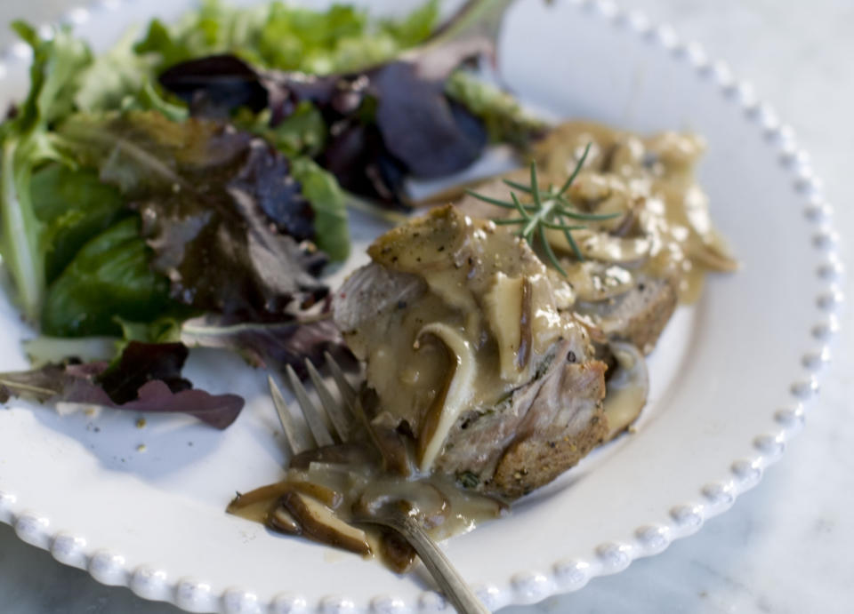 This Nov. 18, 2013 photo shows double pork roast with mushroom marsala sauce in Concord, N.H. (AP Photo/Matthew Mead)