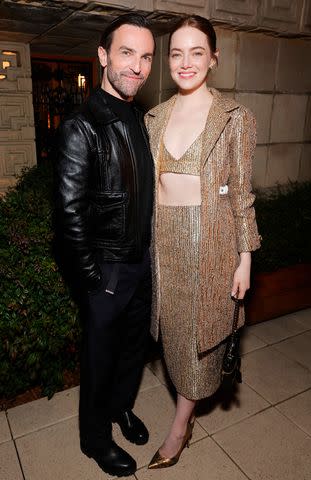 <p>Emma McIntyre/Getty Images</p> Nicolas Ghesquière and Emma Stone attend W Magazine and Louis Vuitton's Academy Awards dinner in Los Angeles