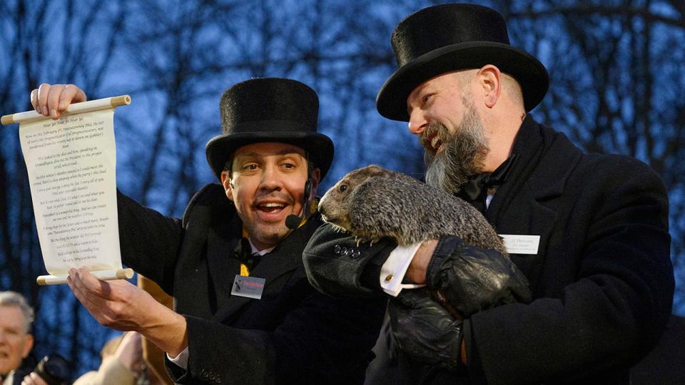 punxsutawney phil on groundhog day with inner circle members