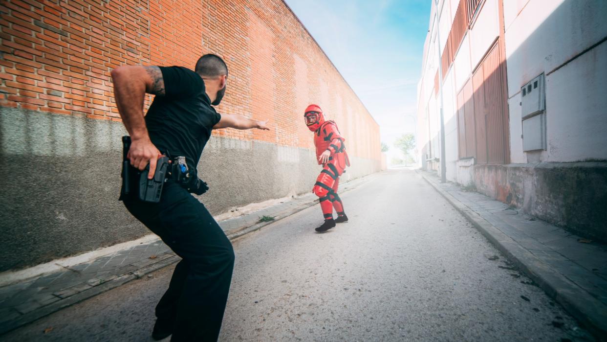  Tactical police training. Man with anti-shock clothing. . 