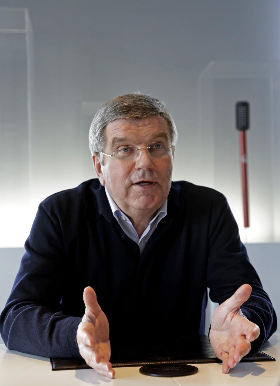 International Olympic Committee President Thomas Bach answers a question in his office during an Associated Press interview at the 2014 Winter Olympics, Saturday, Feb. 22, 2014, in Sochi, Russia. (AP Photo/Morry Gash)