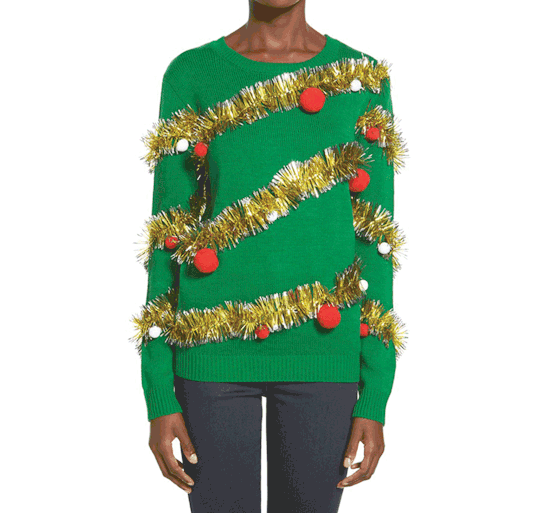 Is it just me, or is this creatively tinsel-wrapped sweater borderline verging on Moschino territory? Very Katy Perry.