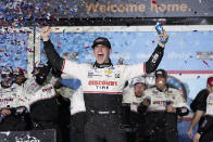 Austin Cindric celebrates in Victory Lane after winning the NASCAR Daytona 500 auto race at Daytona International Speedway, Sunday, Feb. 20, 2022, in Daytona Beach, Fla. (AP Photo/John Raoux)