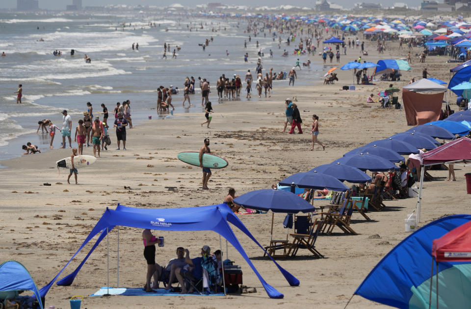 Visitors crowd the beaches in Port Aransas, Texas, ahead of Hurricane Beryl's arrival, Saturday, July 6, 2024. (AP Photo/Eric Gay)