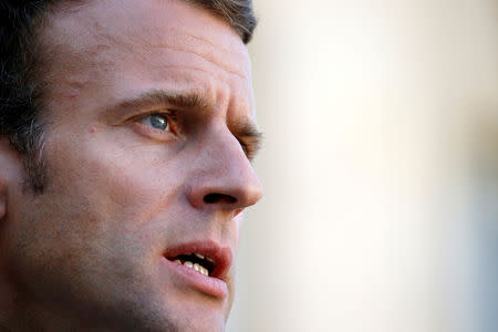 FILE PHOTO: French President Emmanuel Macron waits for a guest at the Elysee Palace in Paris, France, October 16, 2018. REUTERS/Pascal Rossignol/File Photo