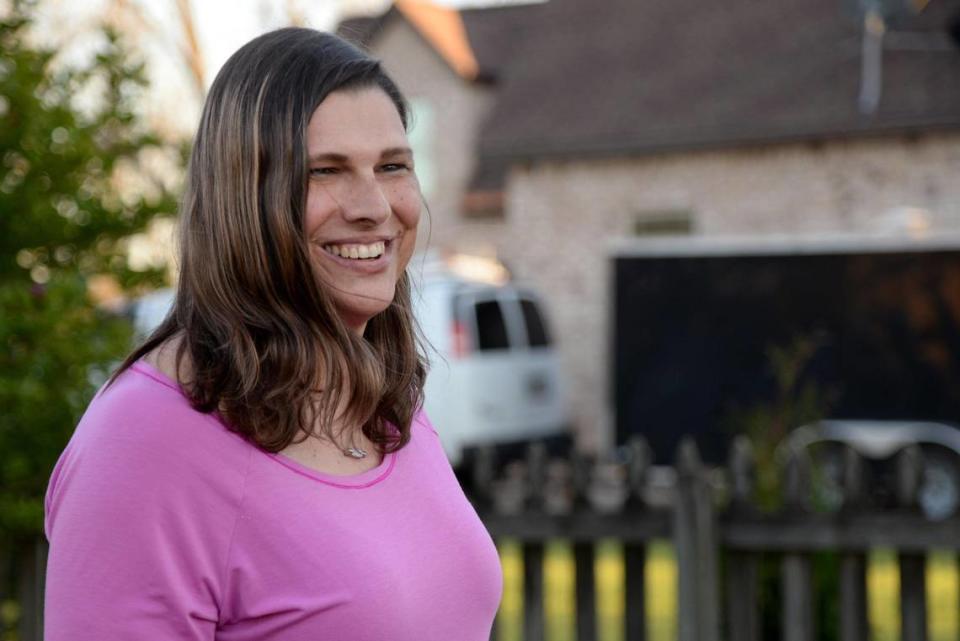 Houston County sheriff’s Sgt. Anna Lange in the back yard of her house near Perry.