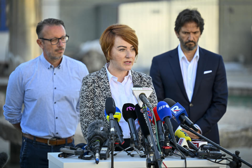 Hospital director Miriam Lapunikova speaks during a media briefing together with Deputy Prime Minister and Defence Minister of Slovakia Robert Kalinak, right, outside the F. D. Roosevelt University Hospital, where Slovak Prime Minister Robert Fico, who was shot and injured, is treated in Banska Bystrica, central Slovakia, Thursday, May 16, 2024. Slovakia's populist Prime Minister Robert Fico was shot multiple times and gravely wounded Wednesday, but his deputy prime minister said he believed Fico would survive. (AP Photo/Denes Erdos)