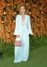 <p>Olivia Wilde also opted for blue at the event in a bell-sleeve co-ord with a pink miniature handbag thrown in for an Insta-worthy pop of colour. <em>[Photo: Getty]</em> </p>