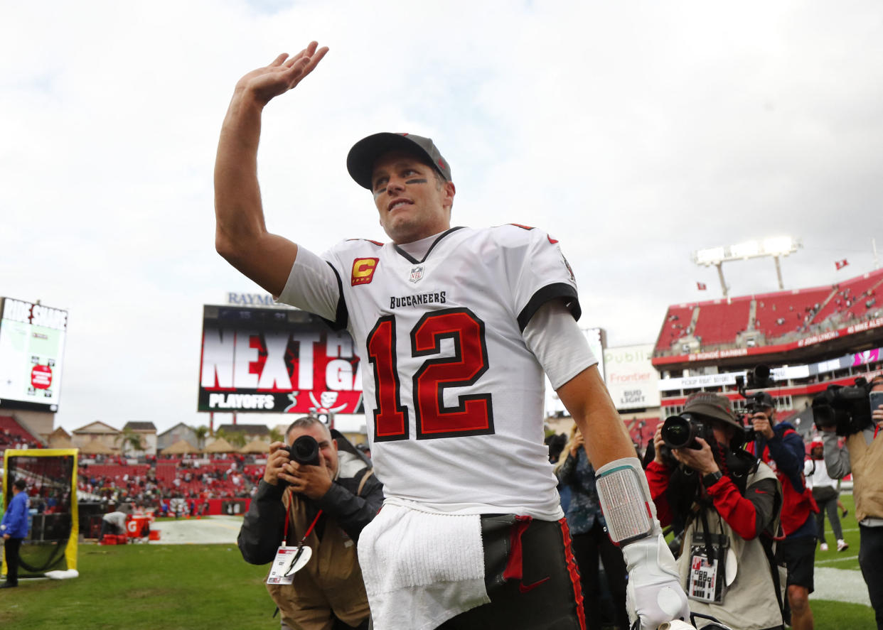 Jan 16, 2022; Tampa, Florida, USA; Tampa Bay Buccaneers quarterback Tom Brady (12) celebrates after they beat the Philadelphia Eagles in a NFC Wild Card playoff football game at Raymond James Stadium. Mandatory Credit: Kim Klement-USA TODAY Sports