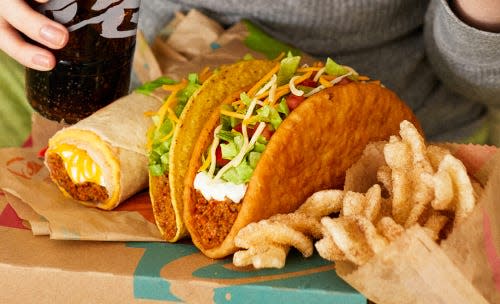 The new $1 Build-Your-Own-Cravings-Box comes with a specialty menu item such as a Crunchwrap Supreme, one classic item such as a Crunchy Taco, and one side such as chips and nacho cheese sauce.