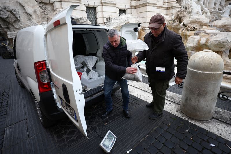 The Wider Image: What happens to the coins tossed into Rome's Trevi Fountain?