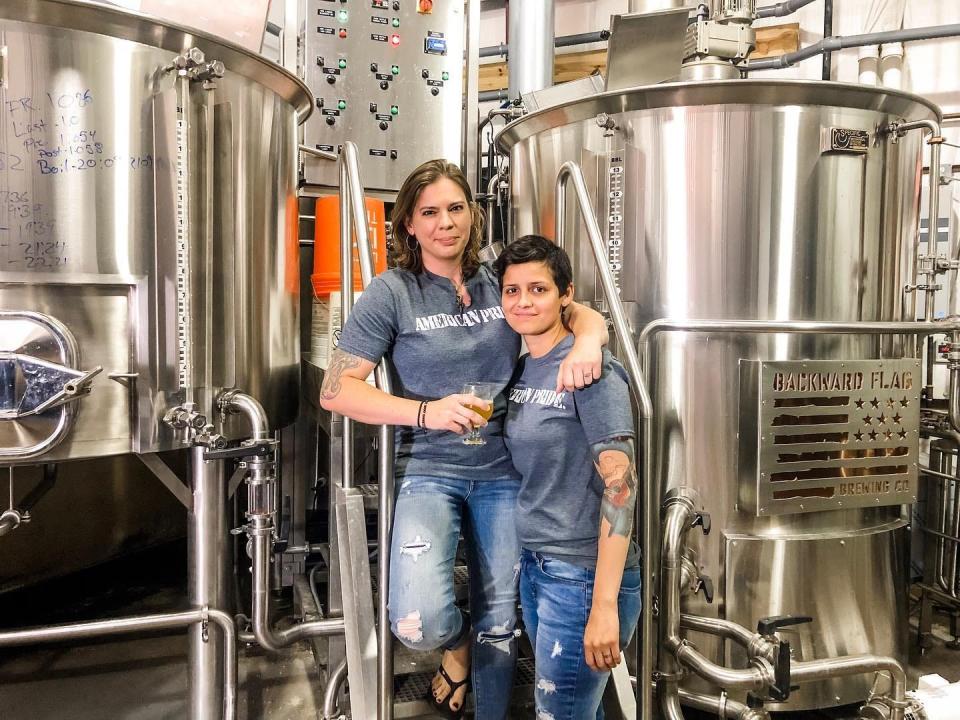 Backward Flag Brewing Co. owner Torie Fisher (left) and head brewer Melinda Gulsever.