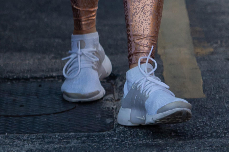 A close-up shot of J-Lo’s Nike sneakers. - Credit: Splash News