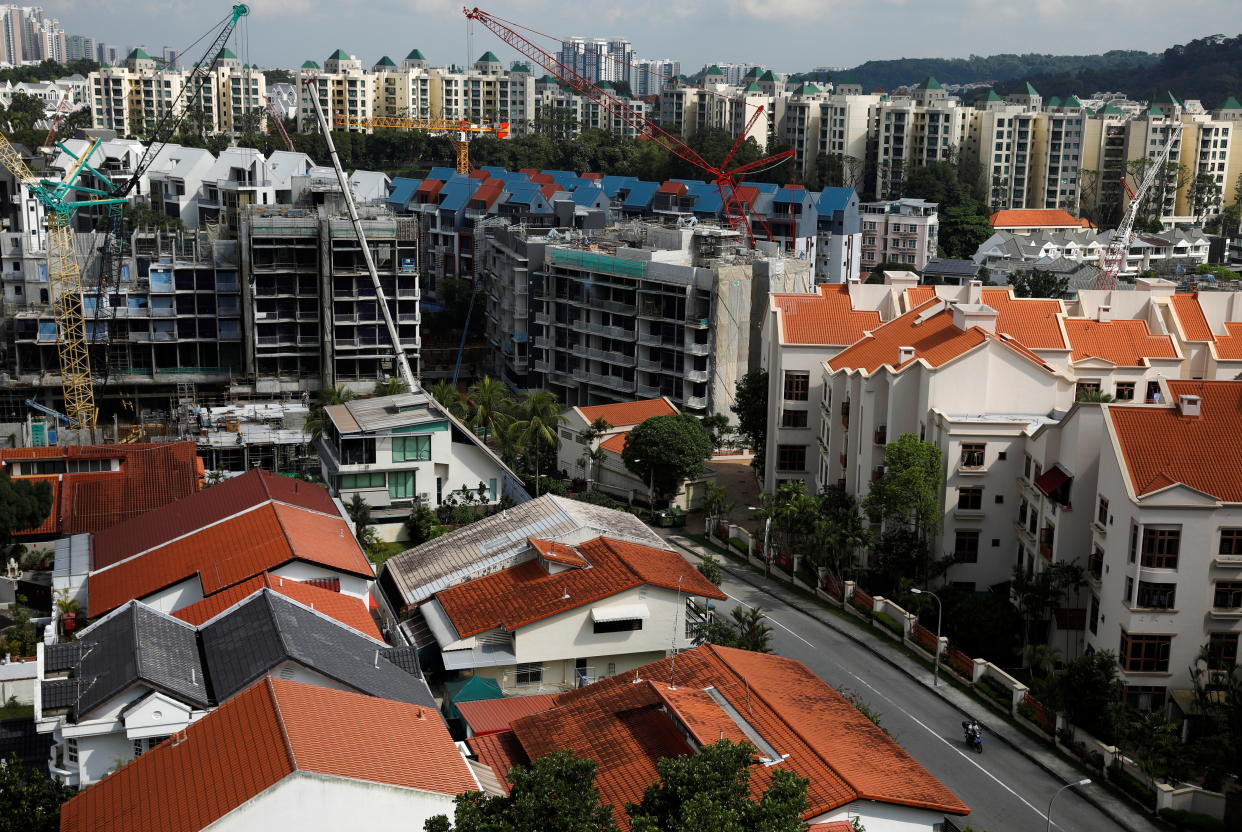  Singapore's new private home sales fell 60% to 650 units in December. (PHOTO: REUTERS/Edgar Su)