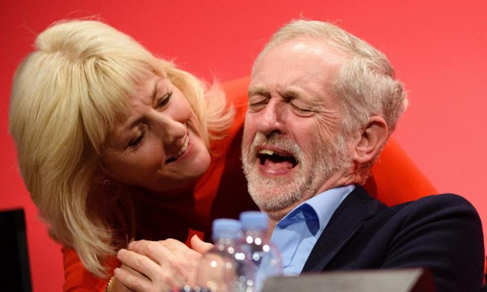 Jeremy Corbyn shares a joke with Jennie Formby.