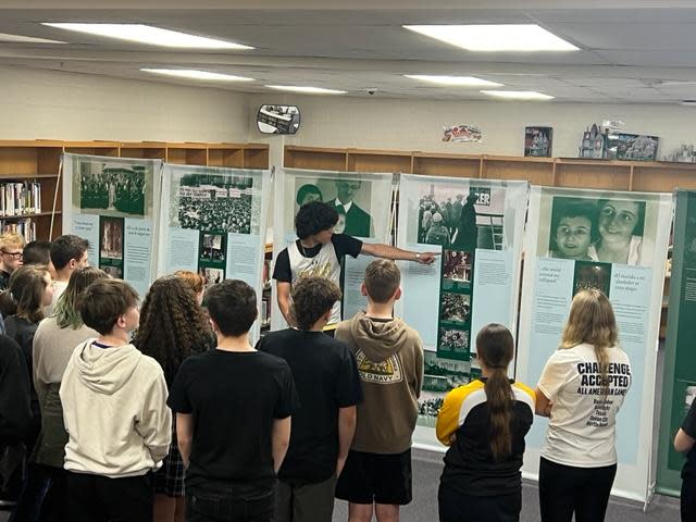 Fourteen Tri-Valley High School students were trained as docents for the Anne Frank Exhibit. They have been giving tours to several area schools since its arrival in April, like the one shown here.