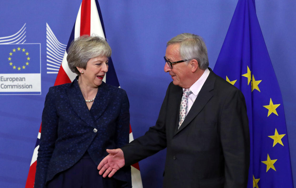 Jean-Claude Juncker welcoming Theresa May to Brussels for Sunday’s summit (Reuters)
