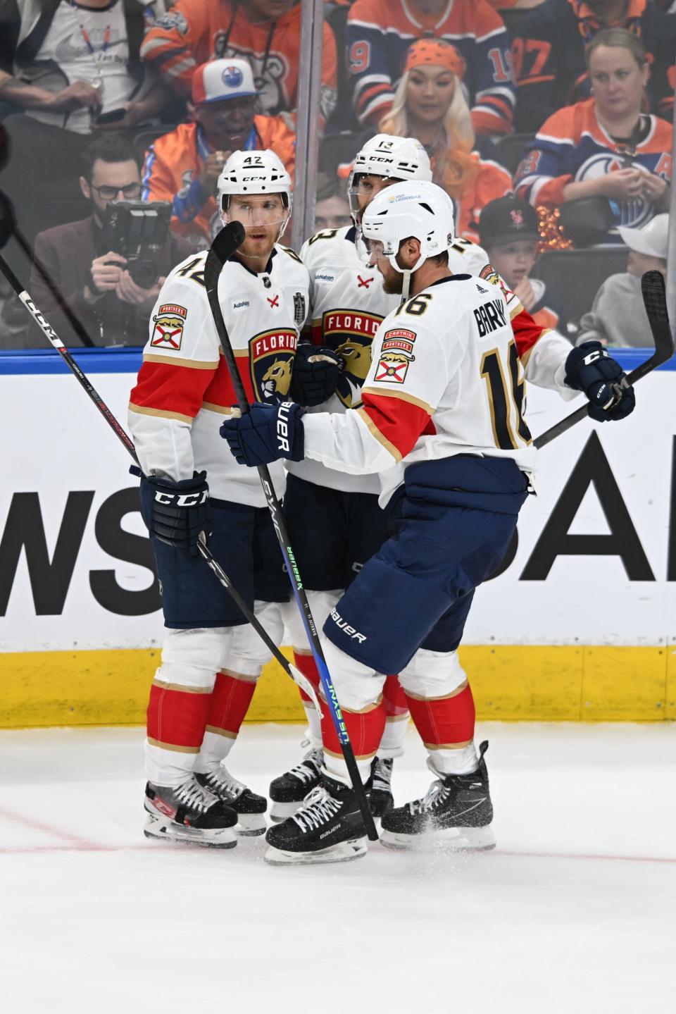 Jun 13, 2024; Edmonton, Alberta, CAN; Florida Panthers center Sam Reinhart (13) celebrates a goal with defenseman Gustav Forsling (42) and center Aleksander Barkov (16) in the first period against the Edmonton Oilers in game three of the 2024 Stanley Cup Final at Rogers Place. Mandatory Credit: Walter Tychnowicz-USA TODAY Sports