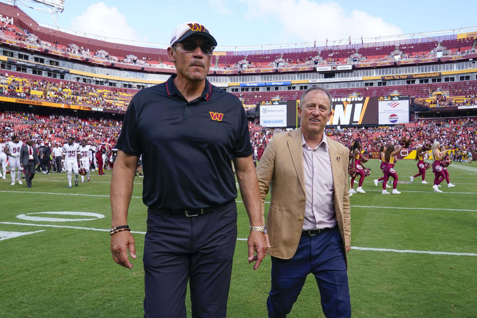 New Washington Commanders owner Josh Harris, right, will be seeking a new stadium for Ron Rivera and the Commanders. (AP Photo/Susan Walsh)