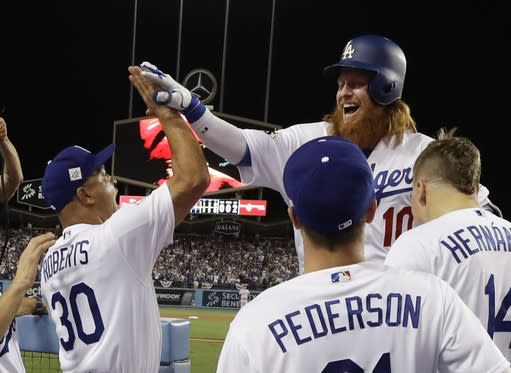 Los Angeles Dodgers' Justin Turner celebrates his two-run home run during Game 1 of the World Series. (AP)