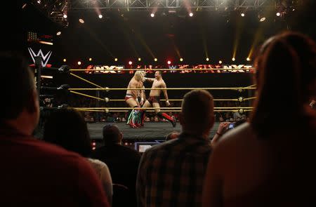 WWE wrestler Bin Wang of China strikes his opponent Wesley Blake during a taping of the WWE's NXT show at Full Sail University in Winter Park, Florida, November 30, 2016. REUTERS/Scott Audette