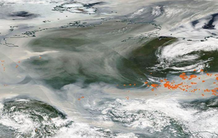 A blanket of smoke emitted from hundreds of forest fires covered most of Russia on August 6, 2021. / Credit: NASA