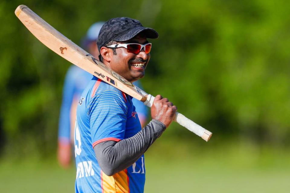 The Lexington Lions’ Sriram Narisetty laughs with his teammates during practice on Saturday, July 6, 2024. The multicultural group that came to practice Saturday is mostly made up of native Telugu speakers, and transitioned between Telugu, Hindi and English seamlessly depending on who they spoke to.