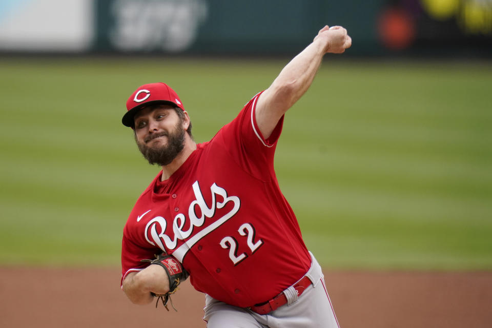 Cincinnati Reds starting pitcher Wade Miley throws during the second inning of a baseball game against the St. Louis Cardinals Saturday, April 24, 2021, in St. Louis. (AP Photo/Jeff Roberson)