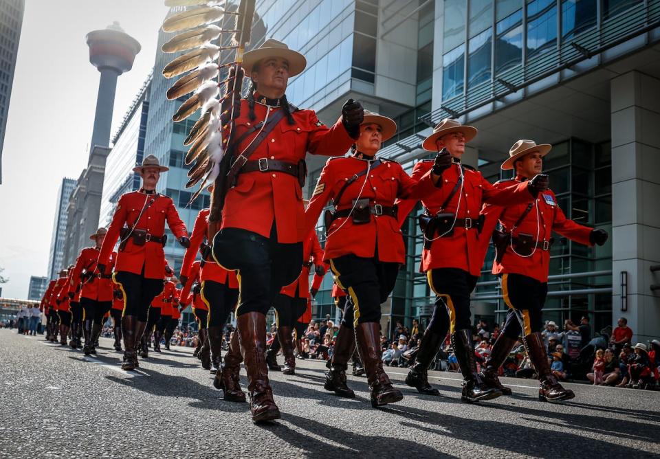 Members of the RCMP take part in the Calgary Stampede parade in Calgary, Friday, July 7, 2023. 