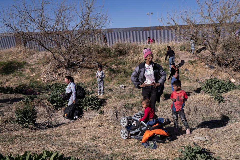 Migrants cross the Rio Grande to El Paso, Texas on March 29, 2023. The migrants had heard false rumors that they would be allowed to seek asylum in the U.S. 