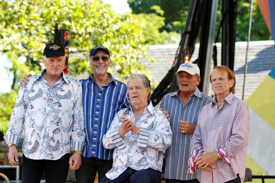 Members of the Beach Boys Mike Love, David Marks, Brian Wilson, Bruce Johnston, and Al Jardine pose for a photo following a performance on ABC's Good Morning America in New York's Central Park in 2012. (REUTERS)