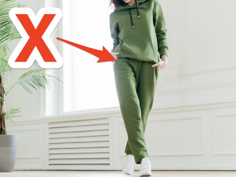 woman wearing green sweatsuit with skitch