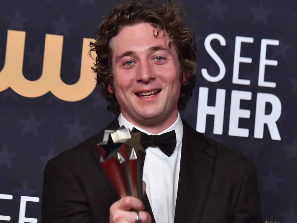 Jeremy Allen White poses in the press room with the award for best actor in a comedy series for "The Bear" at the 28th annual Critics Choice Awards in January 2023.