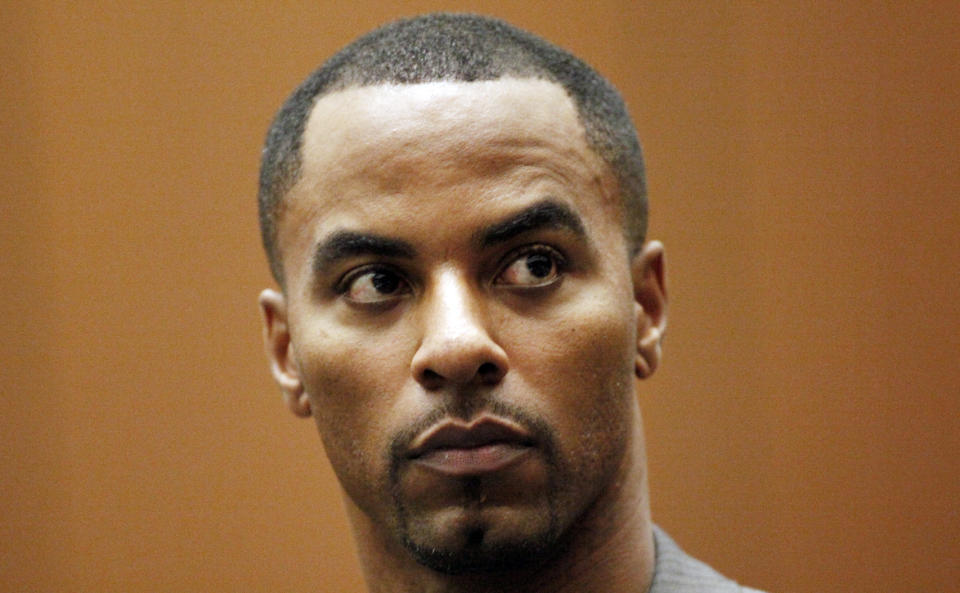 FILE - This feb. 20, 2014 file photo shows former NFL safety Darren Sharper appearing in Los Angeles Superior Court in Los Angeles. Sharper will remain jailed in Los Angeles, despite an arrest warrant issued for him in New Orleans, a judge ruled Friday March 7, 2014. (AP Photo/Los Angeles Times, Bob Chamberlin, Pool)