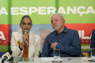 FILE - Congressional candidate Marina Silva, left, speaks during a campaign event with former President Luiz Inacio Lula da Silva, who is running for reelection in Sao Paulo, Brazil, Sept. 12, 2022. A native of the Amazon, Silva had to run from the country's biggest city, São Paulo; her native state of Acre has become a Bolsonaro stronghold. (AP Photo/Andre Penner, File)