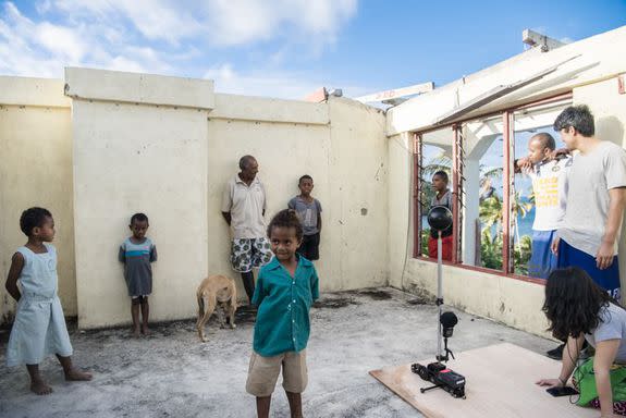 Behind the scenes: Noqu Vanua. Rupeni and children from Namarai village prepare for a scene with the 360 VR camera.