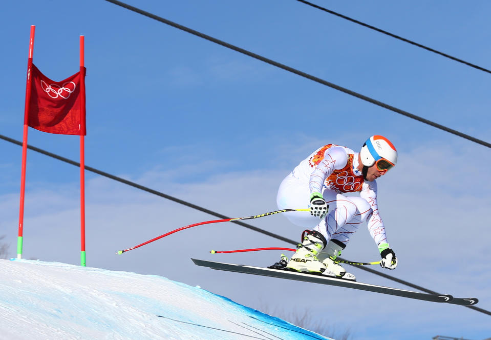 United States' Bode Miller jumps during a men's downhill training run for the Sochi 2014 Winter Olympics, Saturday, Feb. 8, 2014, in Krasnaya Polyana, Russia. (AP Photo/Alessandro Trovati)