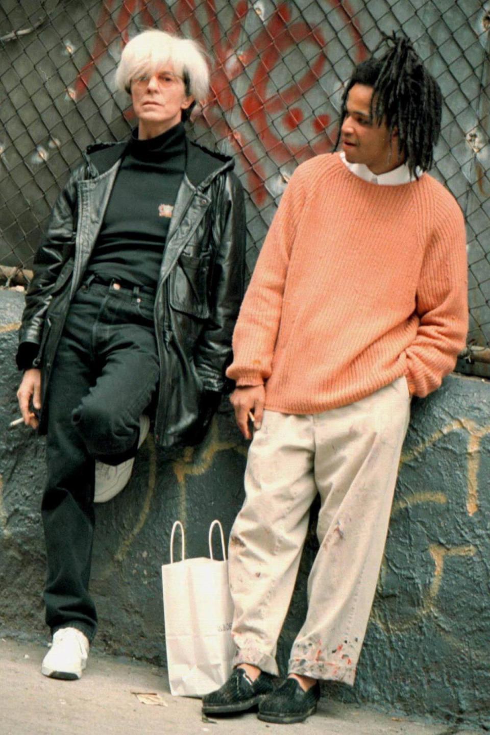 Arting around: David Bowie as Andy Warol and Wright as Jean-Michel Basquiat on the set of the 1996 biopic ‘Basquiat’ (Shutterstock)