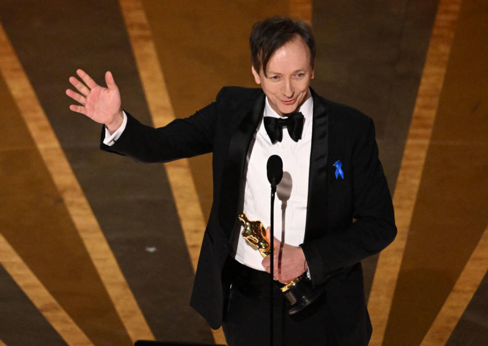 German composer Volker Bertelmann accepts the Oscar for Best Music