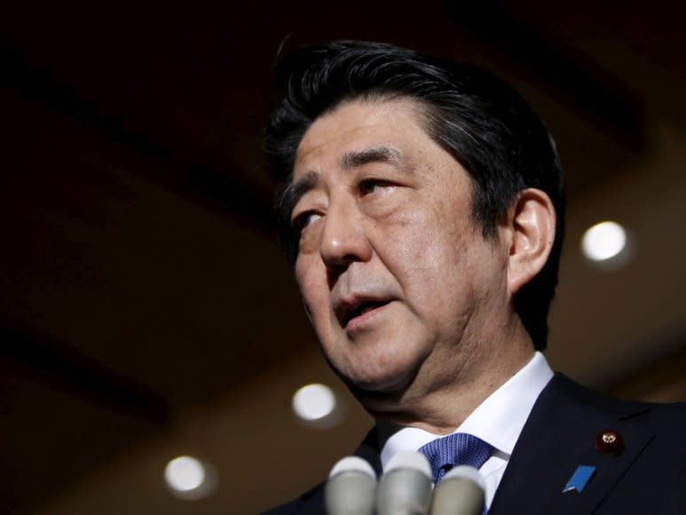 FILE PHOTO: Japan's Prime Minister Shinzo Abe speaks to reporters in Tokyo, Japan, January 28, 2016. REUTERS/Yuya Shino