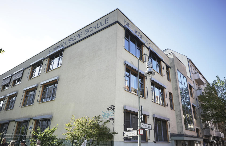 Exterior view of the 'Protestant School Neukoelln' in Berlin, Germany, Wednesday, May 3, 2023. Berlin police say two young children were seriously wounded in an attack at a school in the south of the capital. Police said the victims were girls aged 7 and 8 years. One is in a life-threatening condition, they said in a statement. (Michael Kappeler/dpa via AP)