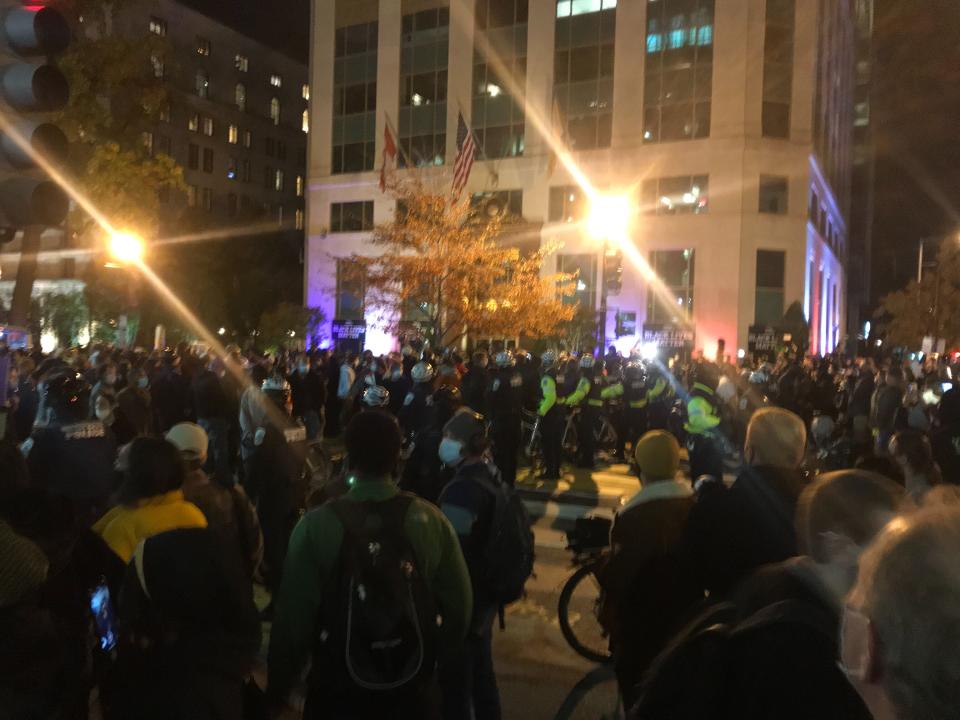 Two blocks from the DC Watch Party at McPherson Square, bicycle police swarm into the Black Lives Matter area in reaction to a disturbance caused by a single man. (Photo by Michael O'Connell/Patch)