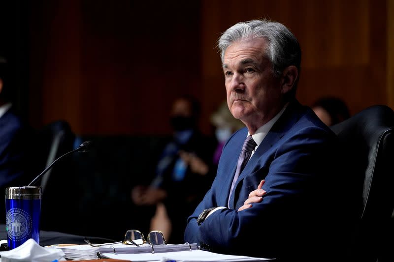 FILE PHOTO: Chairman of the Federal Reserve Jerome Powell listens during a Senate Banking Committee hearing in Washington