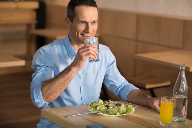 <span class="caption">Calorie restriction remains a crucial tool for longevity seekers.</span> <span class="attribution"><a class="link " href="https://www.shutterstock.com/image-photo/portrait-businessman-having-lunch-cafe-drinking-1067746376?src=e-Th9lWmhQCkBdI4ZjKrlw-1-1" rel="nofollow noopener" target="_blank" data-ylk="slk:AT Production/Shutterstock;elm:context_link;itc:0;sec:content-canvas">AT Production/Shutterstock</a></span>