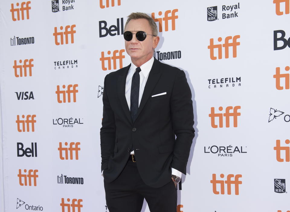 Actor Daniel Craig poses for photographs on the red carpet for the new movie "Knives Out" at the Toronto International Film Festival in Toronto on Saturday, Sept. 7, 2019. (Nathan Denette/The Canadian Press via AP)
