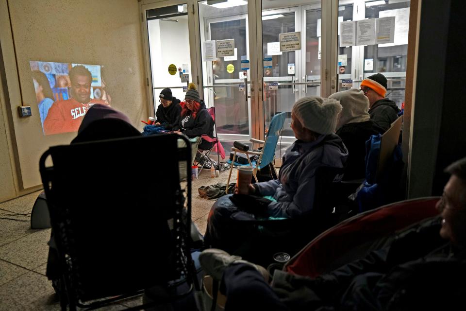 The group watches Mean Girls to pass the time while wait ing in line outside the doors to the Oliver Hodge building to be sure they get a chance to sign up for public comments at the March Oklahoma State Board of Education meeting Thursday, March 28, 2024.